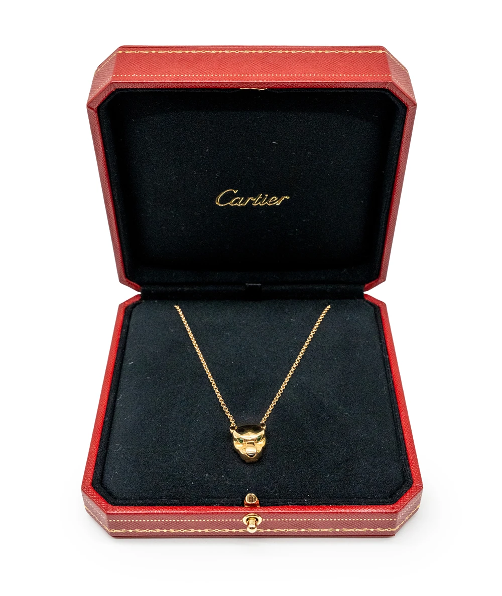 Cartier Panthère de Cartier pendant in 18k Yellow Gold with Onyx and Tsavorite Garnets