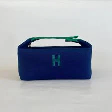 Hermès Bride-a-Brac case featuring green embroidered branding and matching handles Navy Blue PO